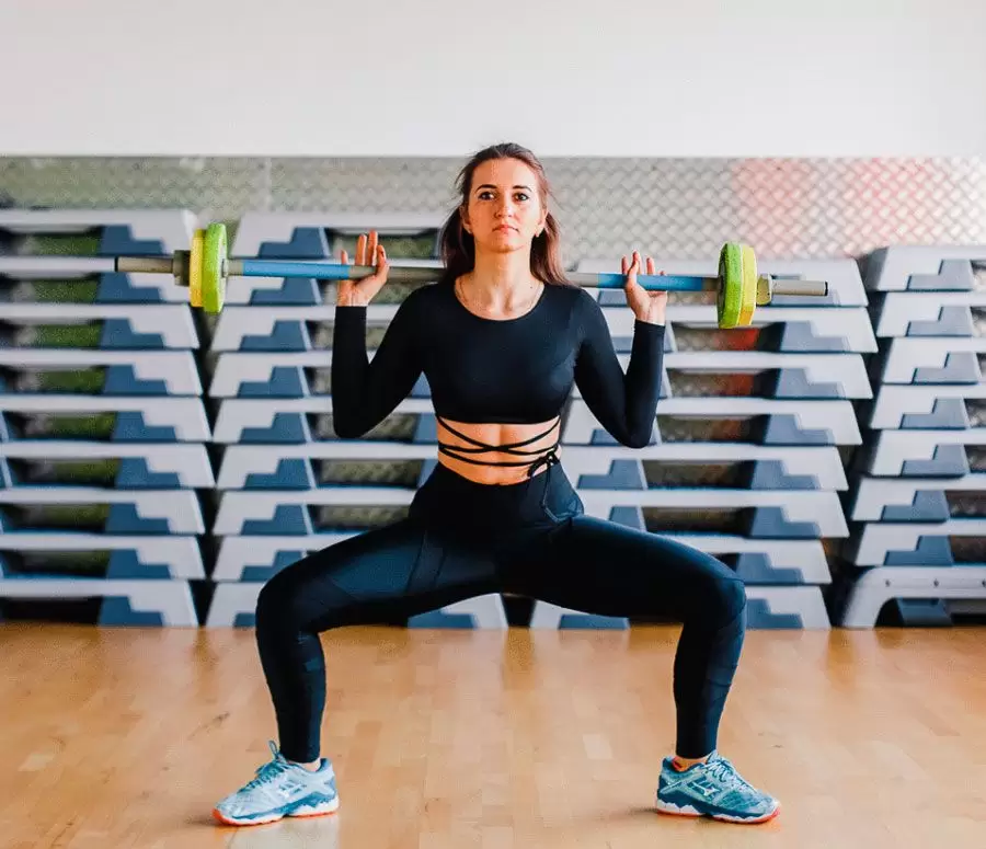 Как делать приседания плие в тренажерке Как делать приседания плие в тренажерке